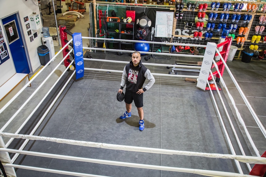 Pensar boxing coach Tyrone "The Cyclone" Tongia in the ring