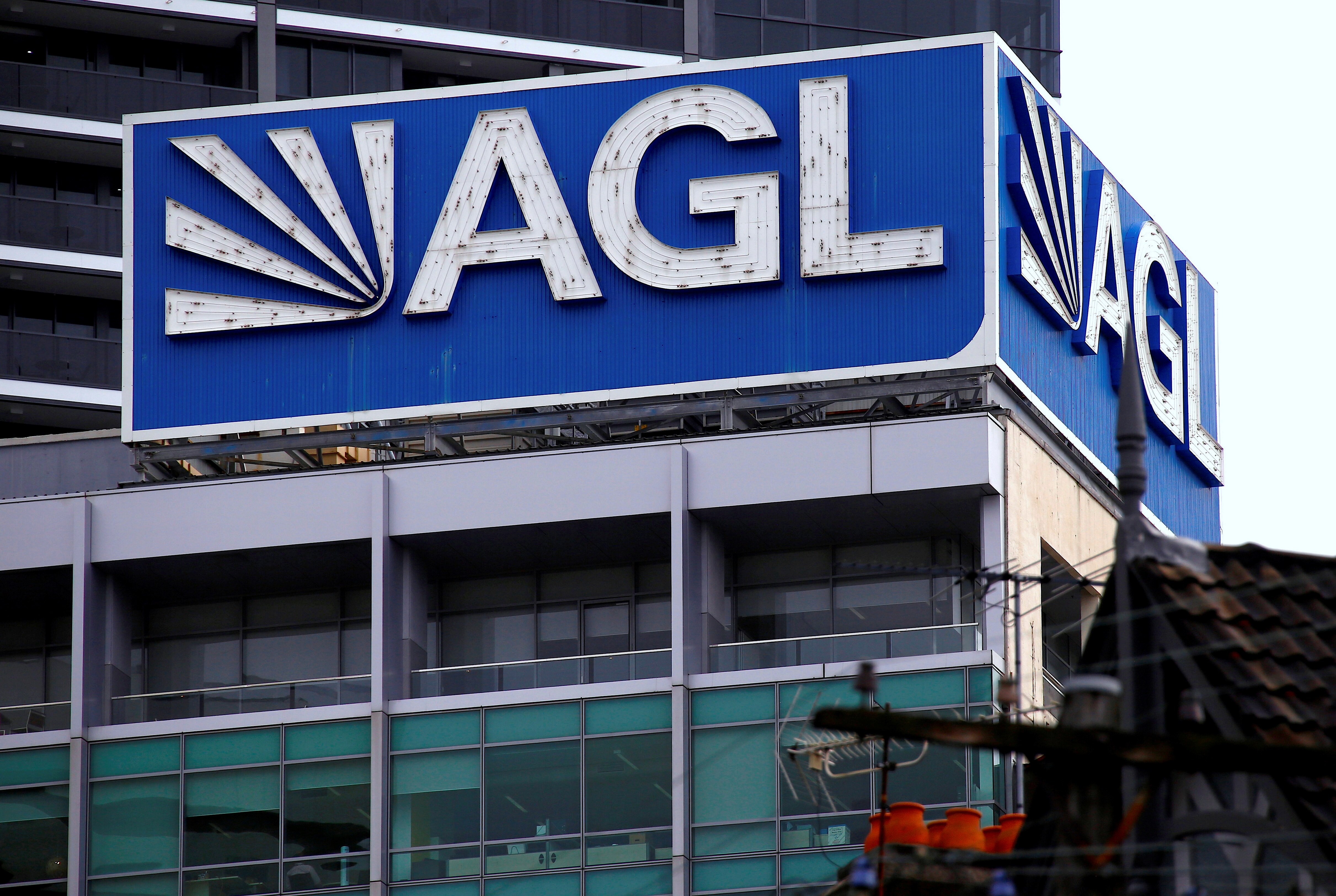 Close up of a building adorned by the AGL logo on the top