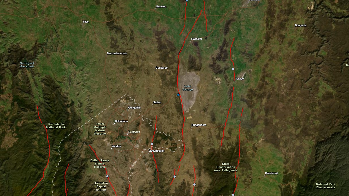 Red lines show where fault lines are near a lake.