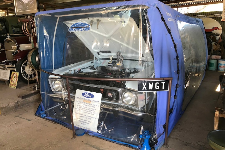 A 1970 XW Ford Falcon GT in a protective, plastic bubble