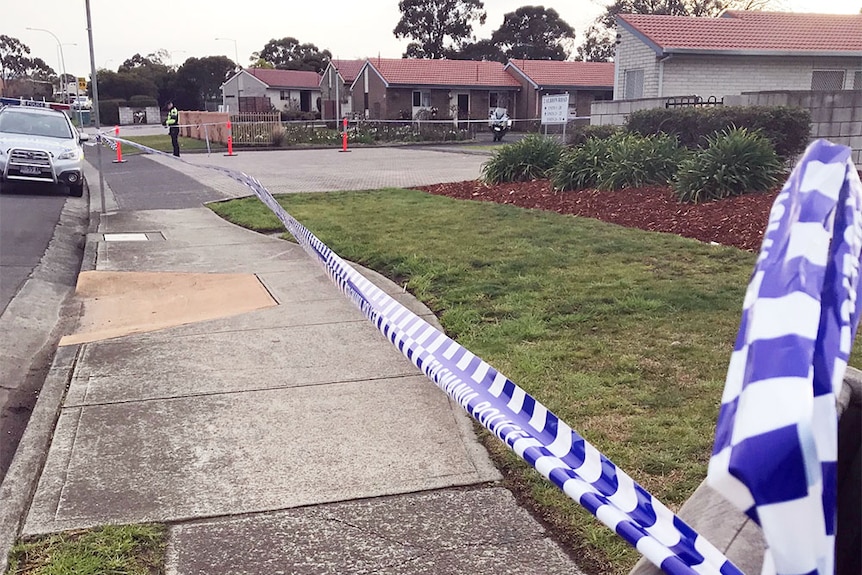 Police cordon outside a unit complex