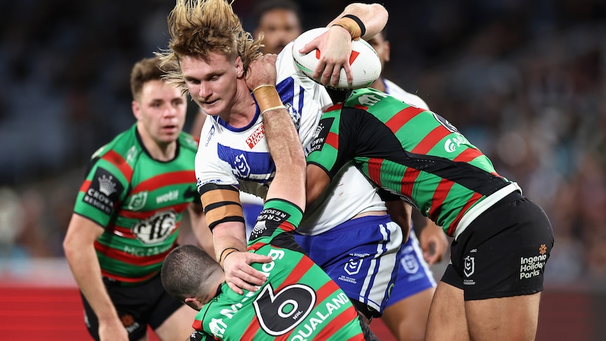 Jacob Preston of the Bulldogs is tackled during the round 19 NRL match between South Sydney Rabbitohs and Canterbury Bulldogs at Accor Stadium on July 08, 2023 in Sydney, Australia.