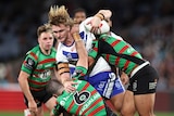Jacob Preston of the Bulldogs is tackled during the round 19 NRL match between South Sydney Rabbitohs and Canterbury Bulldogs at Accor Stadium on July 08, 2023 in Sydney, Australia.