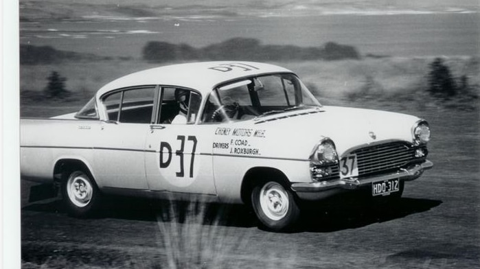 A black and white photo of a light blue Vauxhall Cresta during the 1960 Armstrong 500.