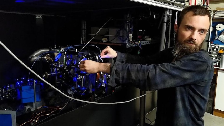 Elliot Bentine working on an apparatus in the laser optics laboratory at the Department of Physics