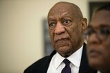 Bill Cosby returns to the courtroom during a break on the second day of his sexual assault trial.