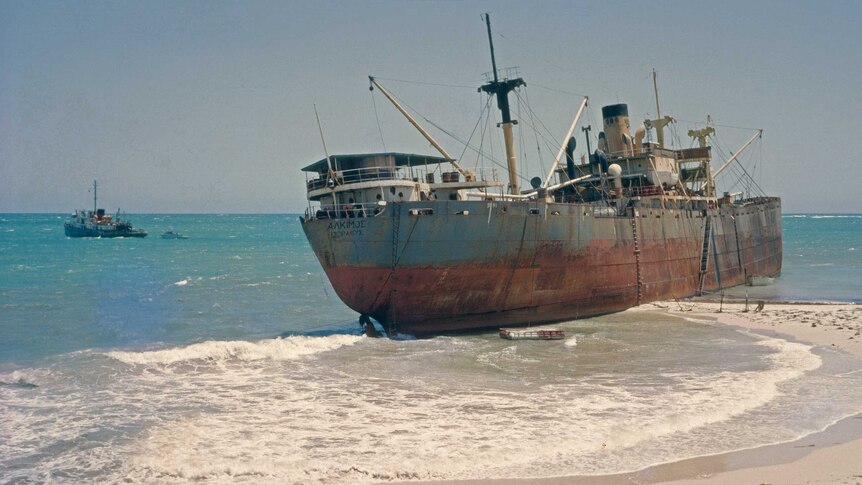 Cargo ship washed up on beach