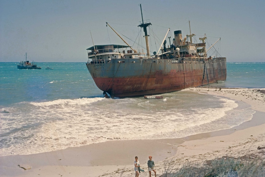 Cargo ship washed up on beach