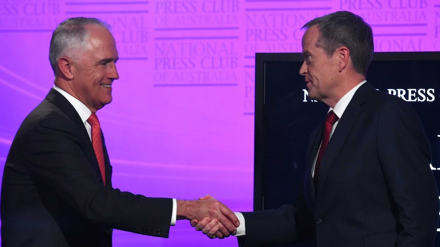 Prime Minister Malcolm Turnbull and Opposition Leader Bill Shorten shake hands after the leaders' debate