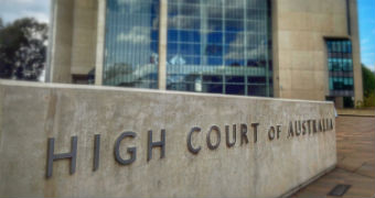 A sign outside the High Court of Australia in Canberra, which says "High Court of Australia".
