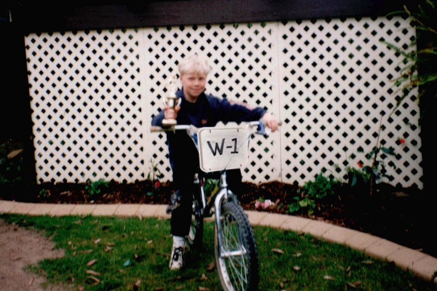 Sam Willoughby in his backyard with W1