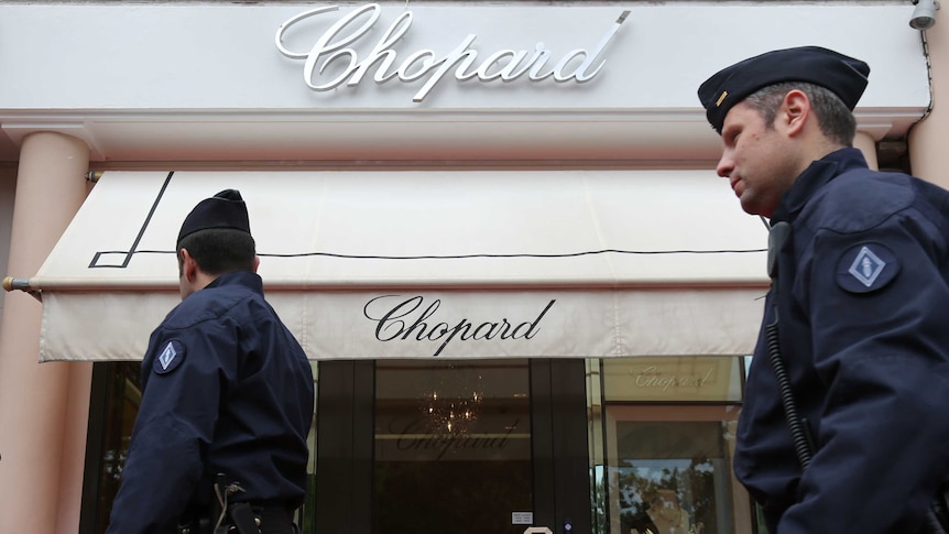 Police patrol outside Chopard store in Cannes