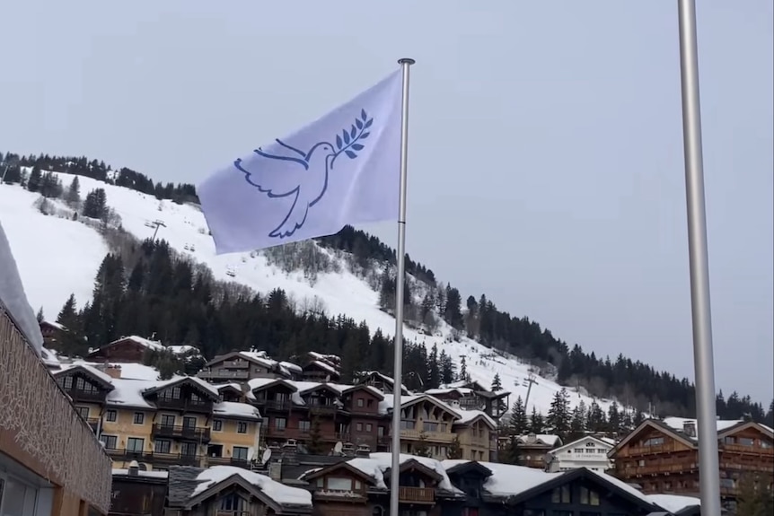 A social media post showing the peace flag flying over Courchevel