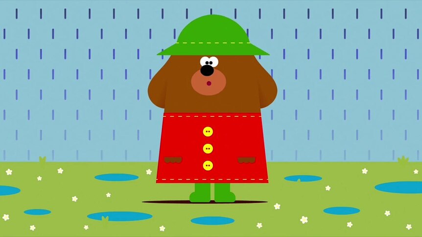 Duggee in raincoat standing in the rain.