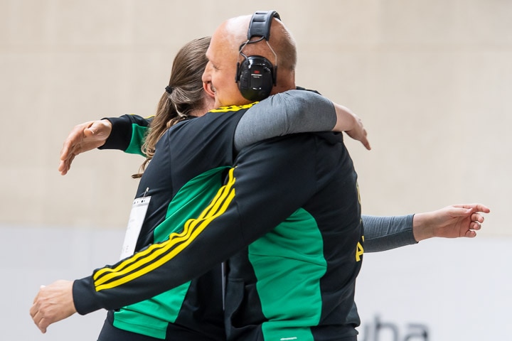 Elena Galiabovitch and her father and coach Vladamir Galiabovitch hug.