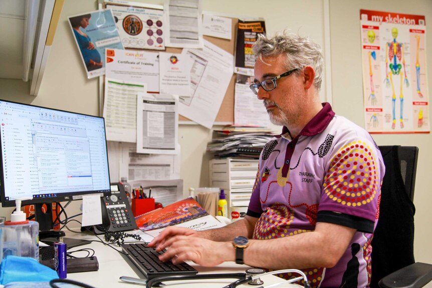 Dr Tim Senior in his consulting room at Tharawal Aboriginal Corporation.