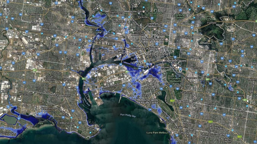 A map shows water flooding the docklands, South Bank, and Victoria University.