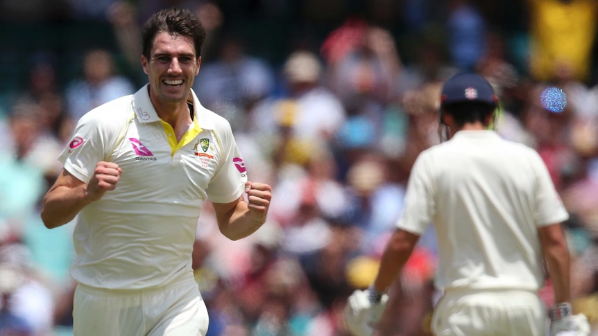 Pat Cummins celebrates a wicket by pumping both fists on day one of the fifth Ashes Test at the SCG.