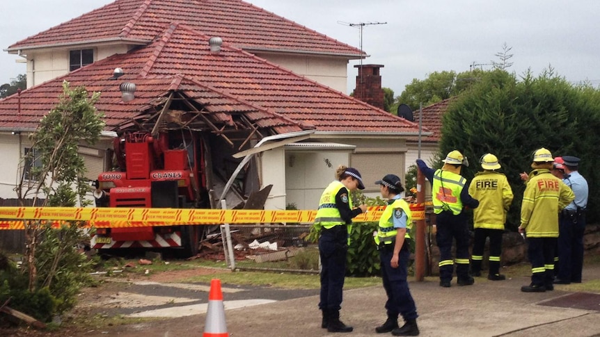 Crane crashes into house at Pendle Hill