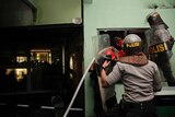 Indonesian police storm Bali's Kerobokan prison during rioting