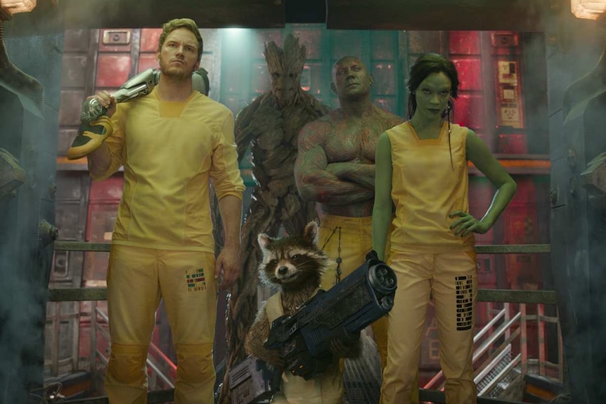 The Guardians of the Galaxy in yellow prison outfits.