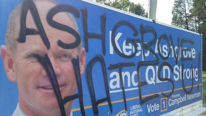 A defaced billboard float in Campbell Newman's Brisbane electorate of Ashgrove