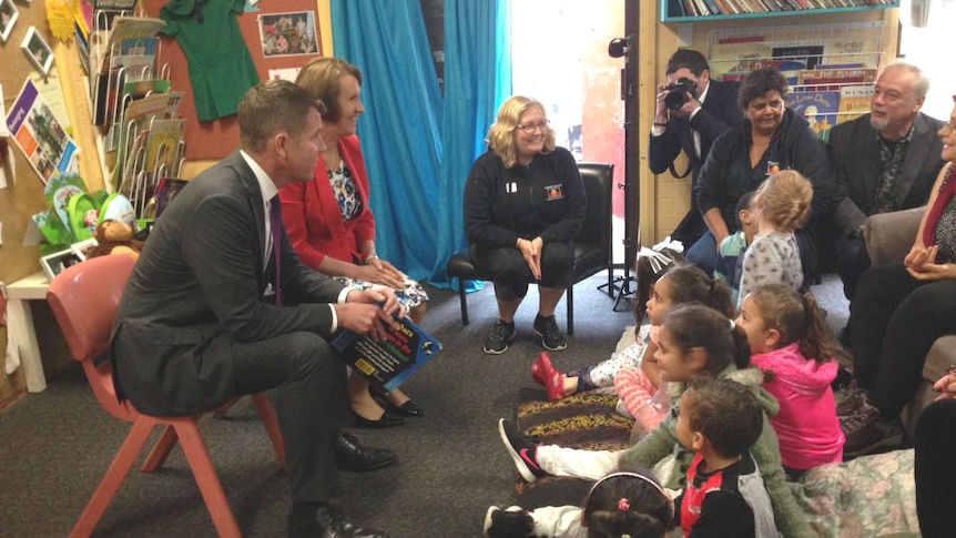 NSW Premier Mike Baird announces a cut to preschool fees in NSW at a Sydney preschool.