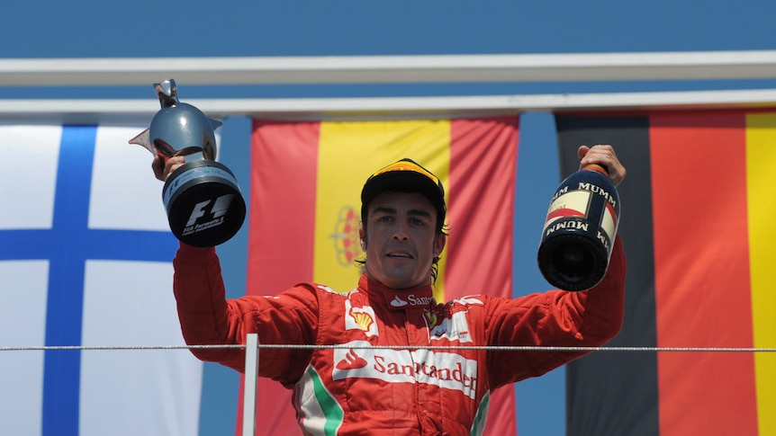 Fernando Alonso celebrates win