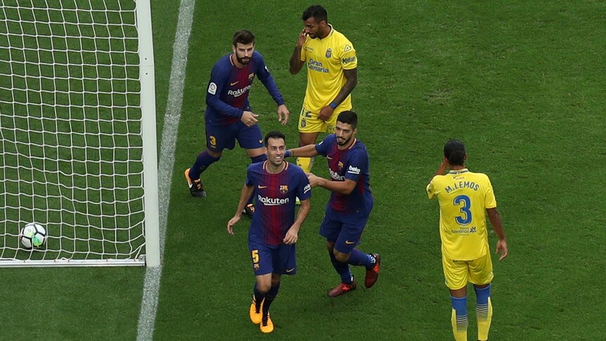 Barcelona celebrates Busquets goal
