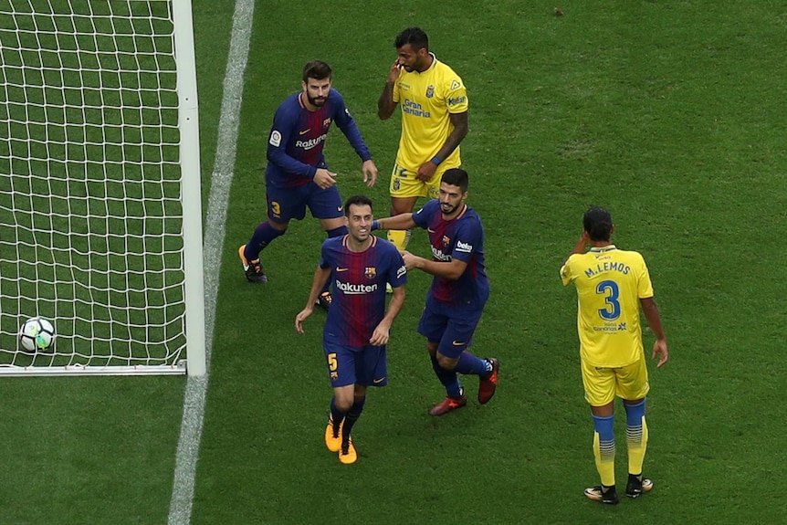 Barcelona celebrates Busquets goal