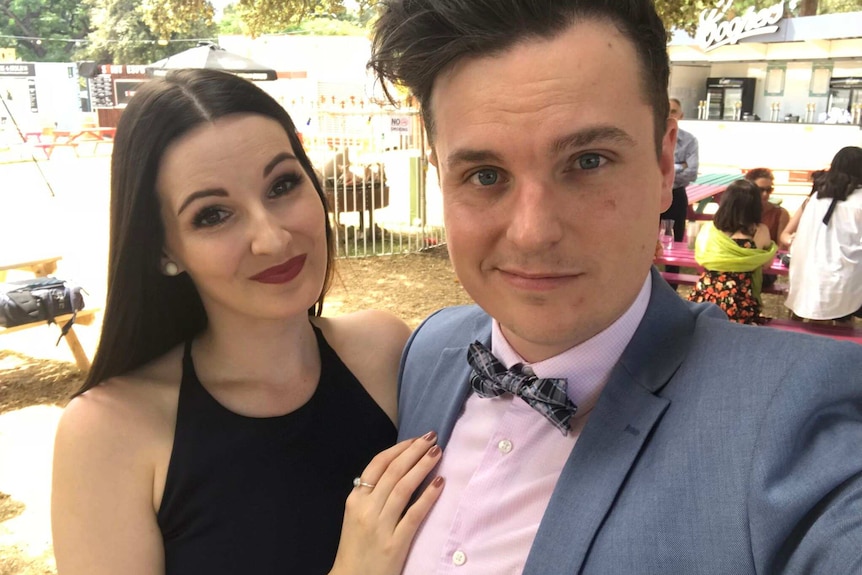 Matt and partner Kiera Blackwood smile in a selfie. They are wearing formal dress, Matt wears a bowtie.