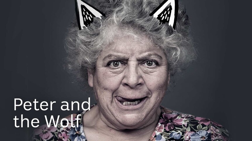 Miriam Margolyes, poking her tongue out, with cartoon wolf ears on her head