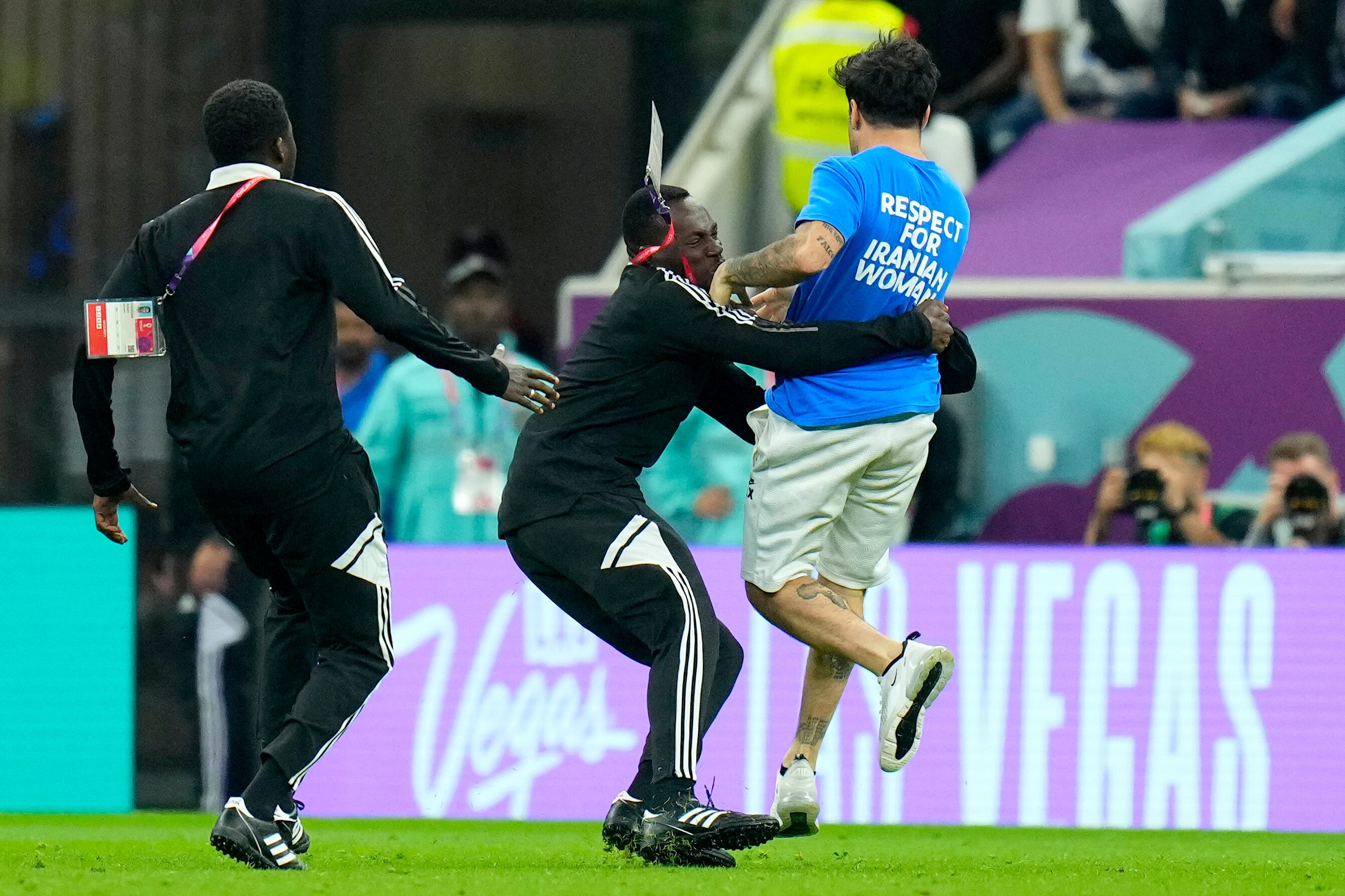 World Cup protester brings rainbow flag onto field during Portugal and ...