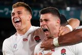 England players hug Ben Youngs, who is screaming, after scoring what he thought was a try in the Rugby World Cup semi-final.