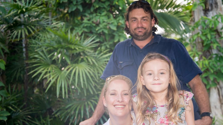 A family portrait of Alex, Glen and Charlotte Crichton five years after Alex gave birth to Charlotte in a makeshift hospital.