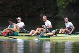 Australia's silver medallists in rowing's men's four event react as winning British crew celebrates.