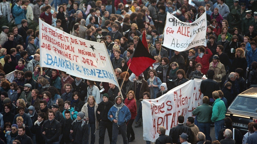 Protesters at Berlin Wall, 1989