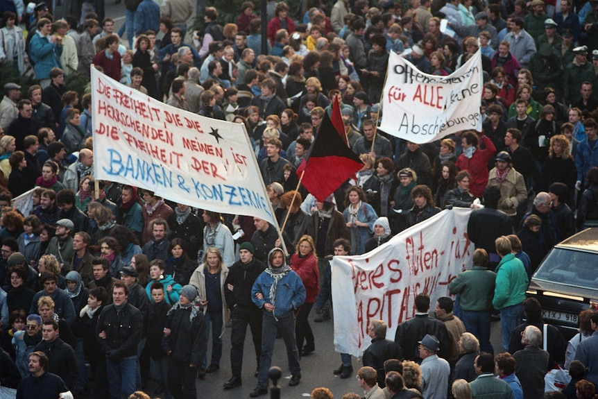 Protesters at Berlin Wall, 1989
