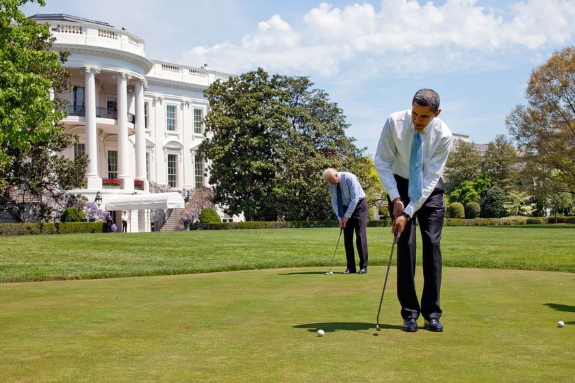 President Barack Obama and Vice President Joe Biden practise their putting