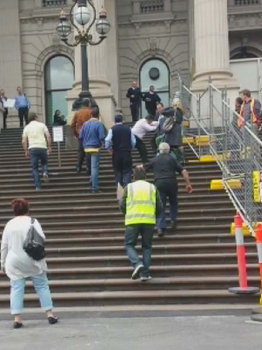 Altercation on the steps of Parliament