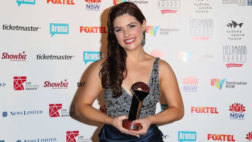 Lucy Durack poses with her Helpmann Award, won for Best Female Actor in a Musical.