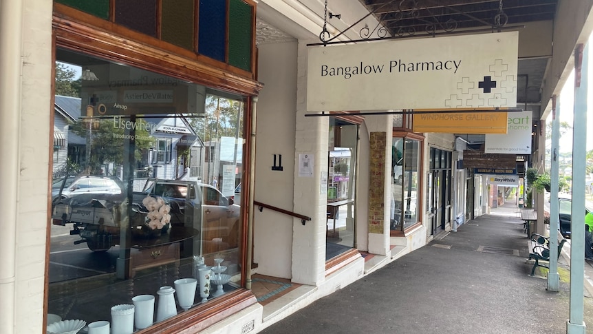 Bangalow's main street including the town's pharmacy in the foreground