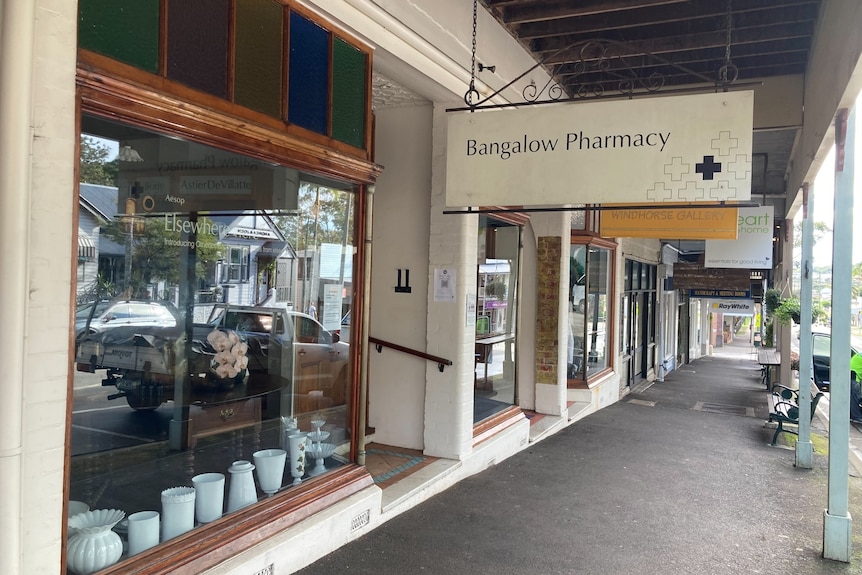 Bangalow's main street including the town's pharmacy in the foreground