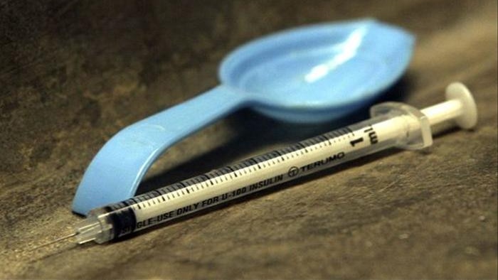 A discarded drug users syringe