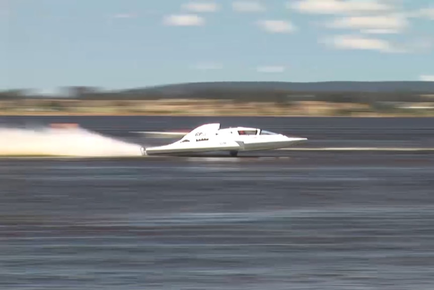 a speed boat races across the water