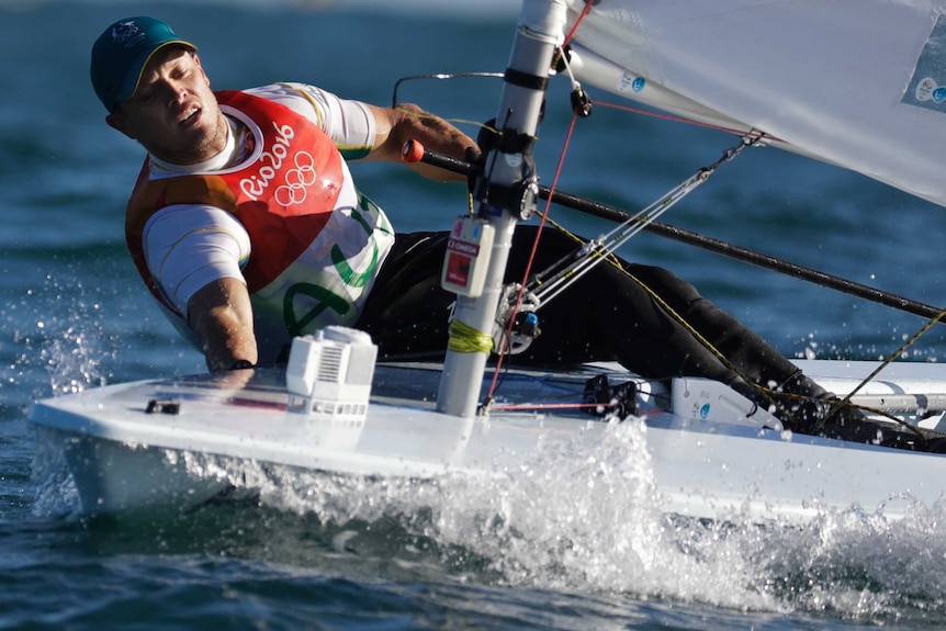 Australia's Tom Burton competes during the Laser men race in Rio