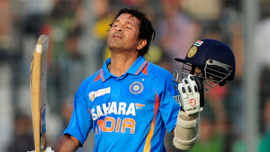 Living legend ... Sachin Tendulkar looks to the heavens after scoring his 100th century.