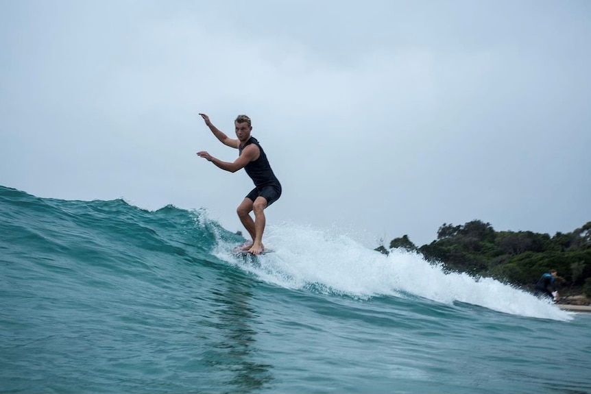 A man surfing