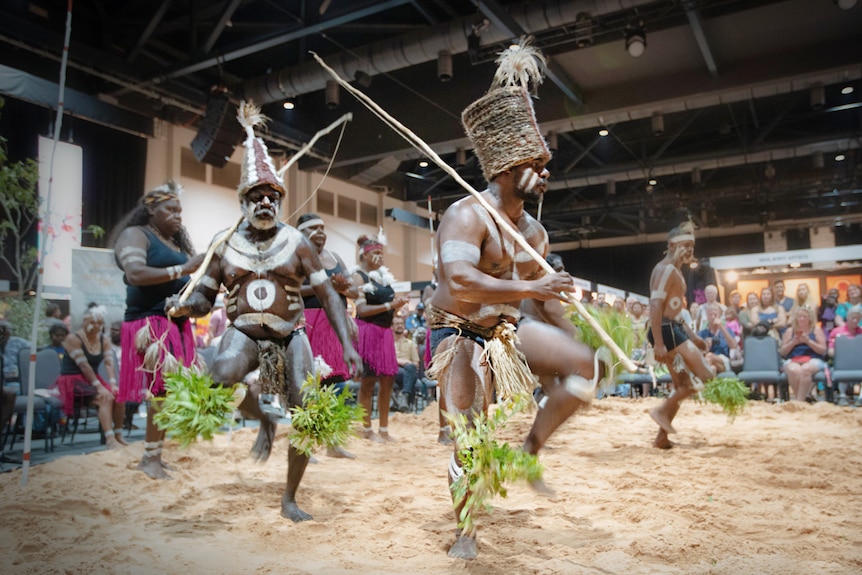 Indigenous dancers performing.