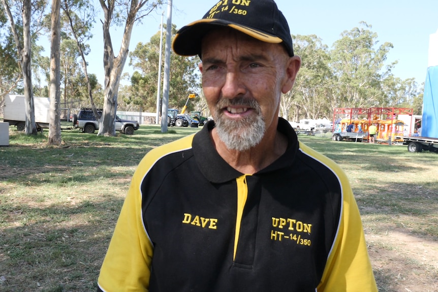 Tractor enthusiast Dave Bowden wearing a specially designed 'Upton HT-14/350' hat and t-shirt.